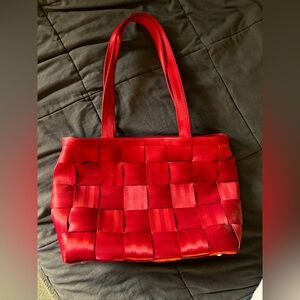 The amazing Harvey’s Seatbelt bag! Stunning and durable. Bright red!